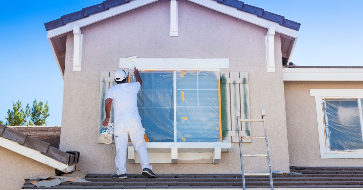 The Rich Co Inc. painting crew refreshing a property exterior in Colorado Springs, CO