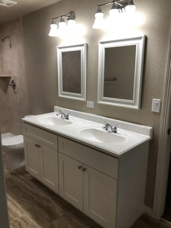 The Rich Co Inc. — finished double-vanity bathroom project in Colorado Springs